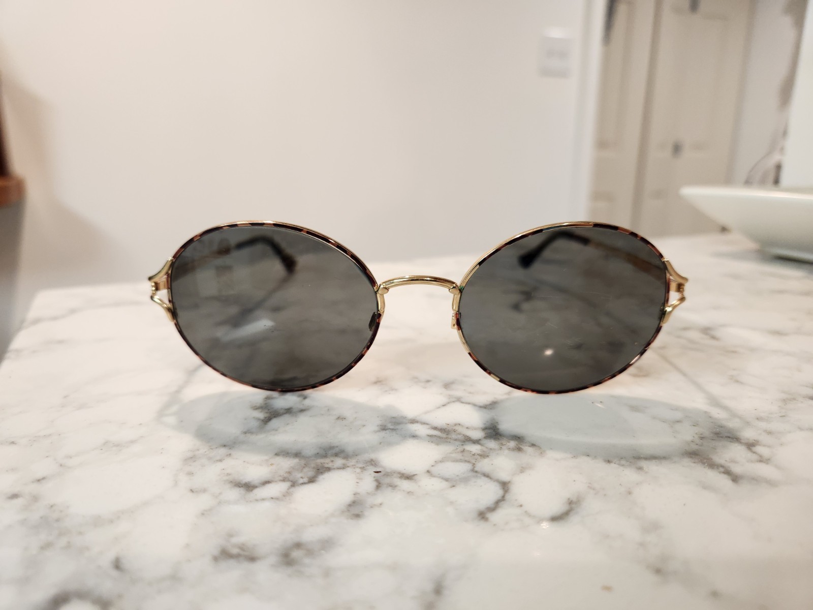 Montatura occhiali da sole Yves Saint Laurent cuore tono oro occhiali fashion designer