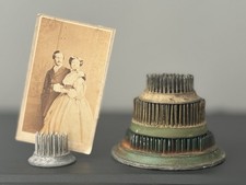 Collection of Antique Metal Flower Frogs in Varying Sizes