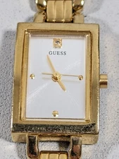 Guess Silver Tone Dial Rectangle Gold Tone Case Link Bracelet Band Watch