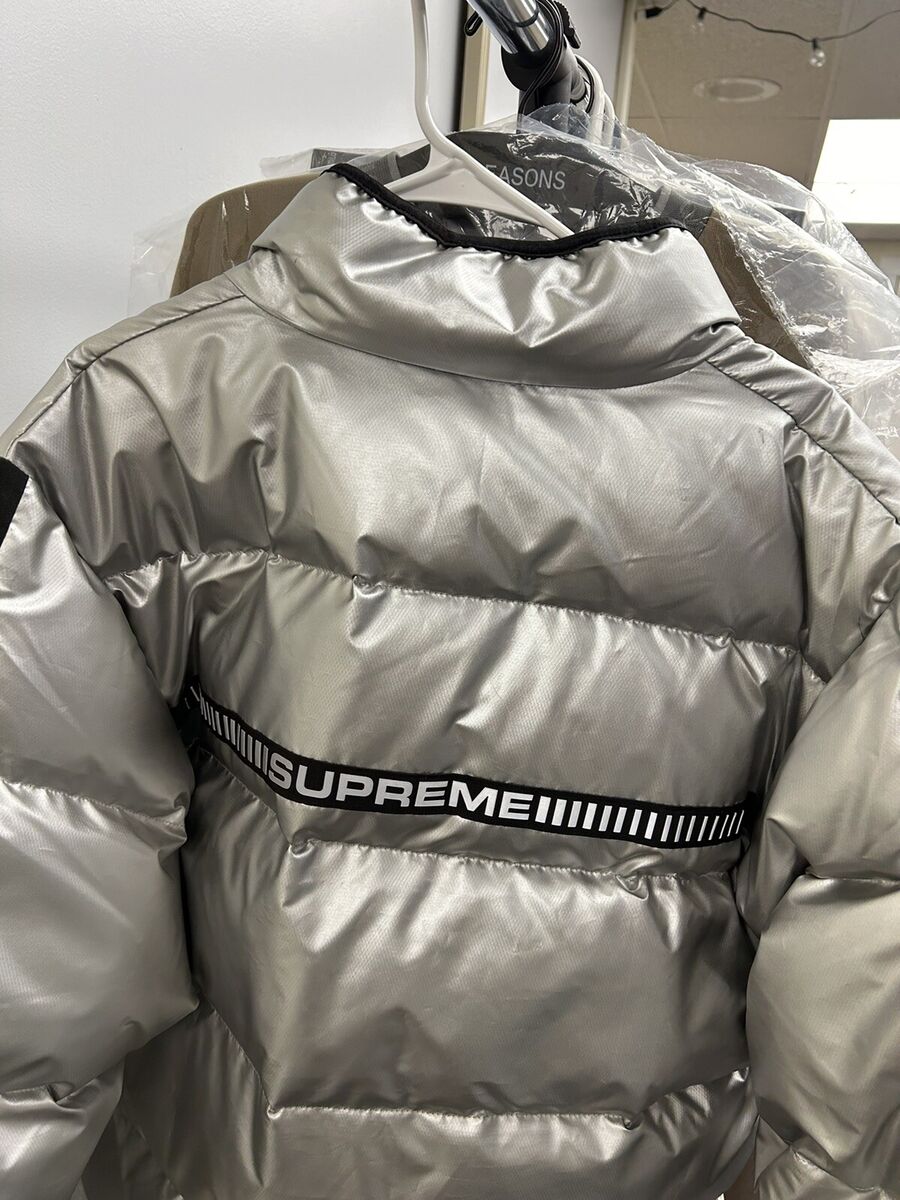 Supreme Reflective Sleeve Logo Puffy Jacket Silver Mens Supreme Reflective Sleeve Logo Puffy Jacket Silver Mens