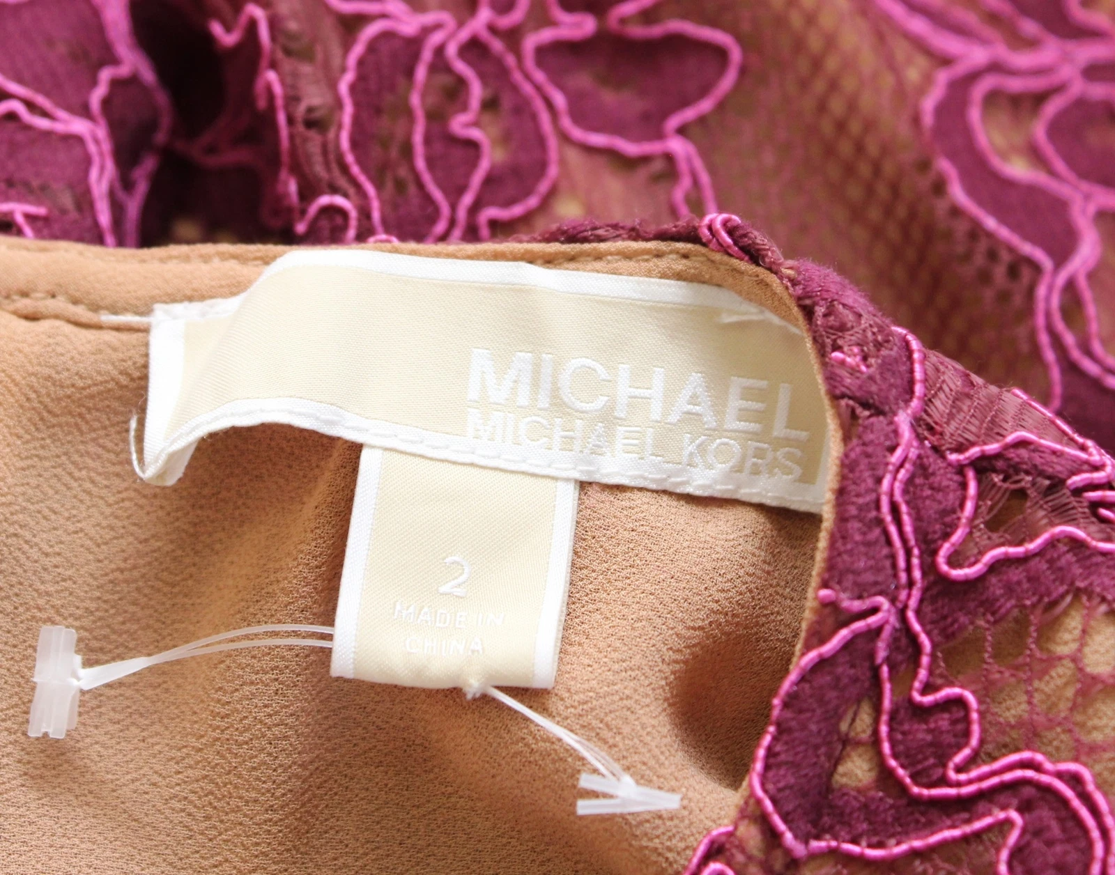 Abito da festa in pizzo floreale Michael Kors con corda spalmata taglia 2 rosa manica gonfia