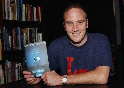 Actor Jay Mohr poses with a copy of his new book Gasping For Airti- Old Photo