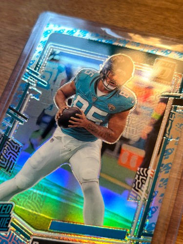 2023 Donruss Optic - Brenton Strange - Rated Rookie - Rocket Emoji Prizm SSP π - Picture 2 of 3