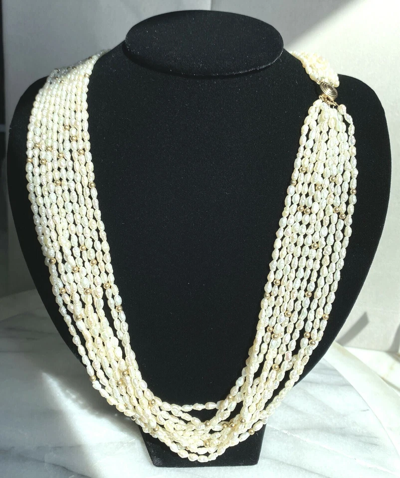 Collar Torsade 23" Cierre Oro Amarillo 14K 10 Hilos Perla Keshi con Cuentas de Oro
