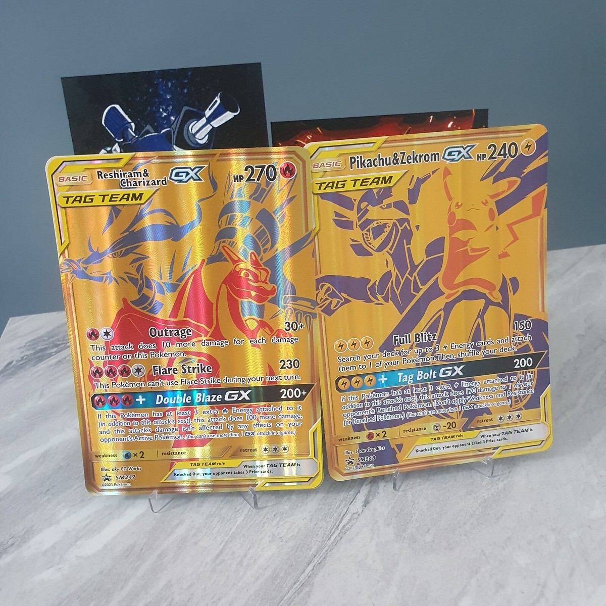 Pokémon TCG Jumbo Charizard & Reshiram SM247 Pikachu & Zekrom