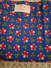 Cotton Fabric. Christmas Theme. Santa on Blue. By The Yard.