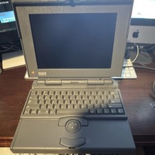   Apple Macintosh PowerBook 140 with original adapter and case  