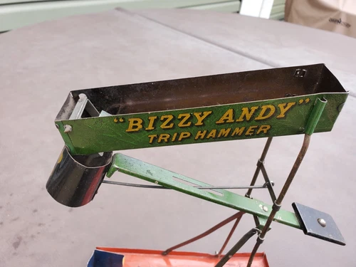 Vintage Tin Wolverine Bizzy Andy Articulated trip hammer