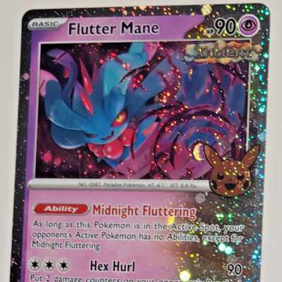 Pretty much a perfect cosmos Pokemon orb - Flutter mane Trick or Trade 2024 NM