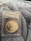 $1 1882 CC Morgan Dollar PCGS MS 62 Light Rim Toning