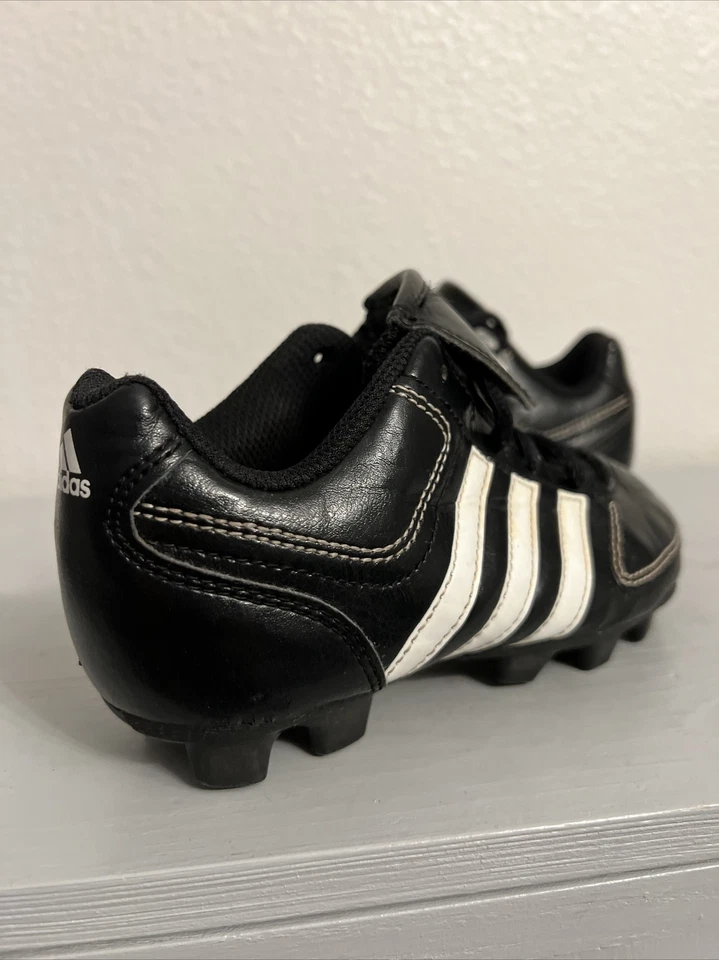 TACOS DE FÚTBOL ADIDAS CHANGE UP MD NIÑOS NEGROS TALLA 12K (USADOS) Foto 2 de 4