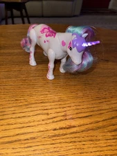 Little Live Pets Dancing Unicorn Neighs Lights Up Plays Music by Moose Toy Works