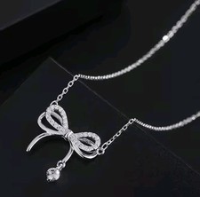 Double Bow Necklace, Silver Tone Trendy Design with Versatile Waterdrop Pendant