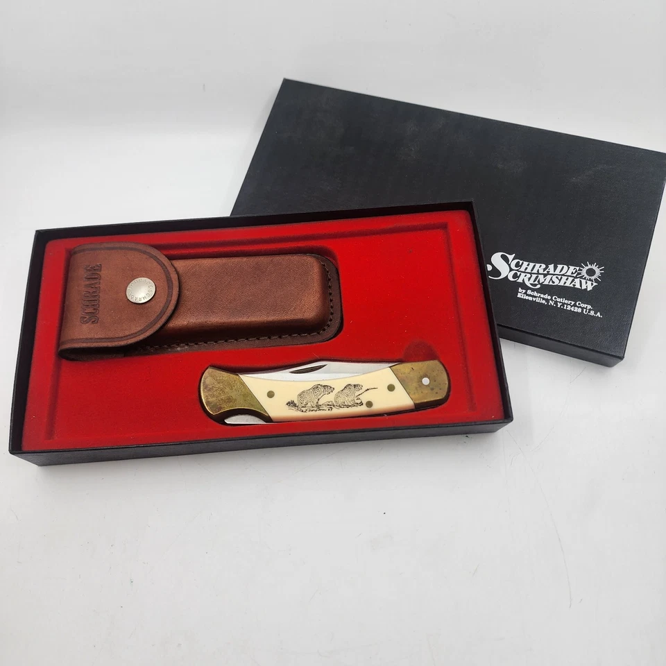 NAVAJA DE BOLSILLO PLEGABLE VINTAGE SCHRADE SC507 SCRIMSHAW TIGERS HECHA EN EE. UU. Foto 2 de 4
