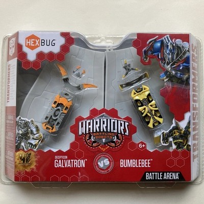 New in Box - HEXBUG Warriors Transformers Galvatron vs Bumblebee w/ Battle Arena