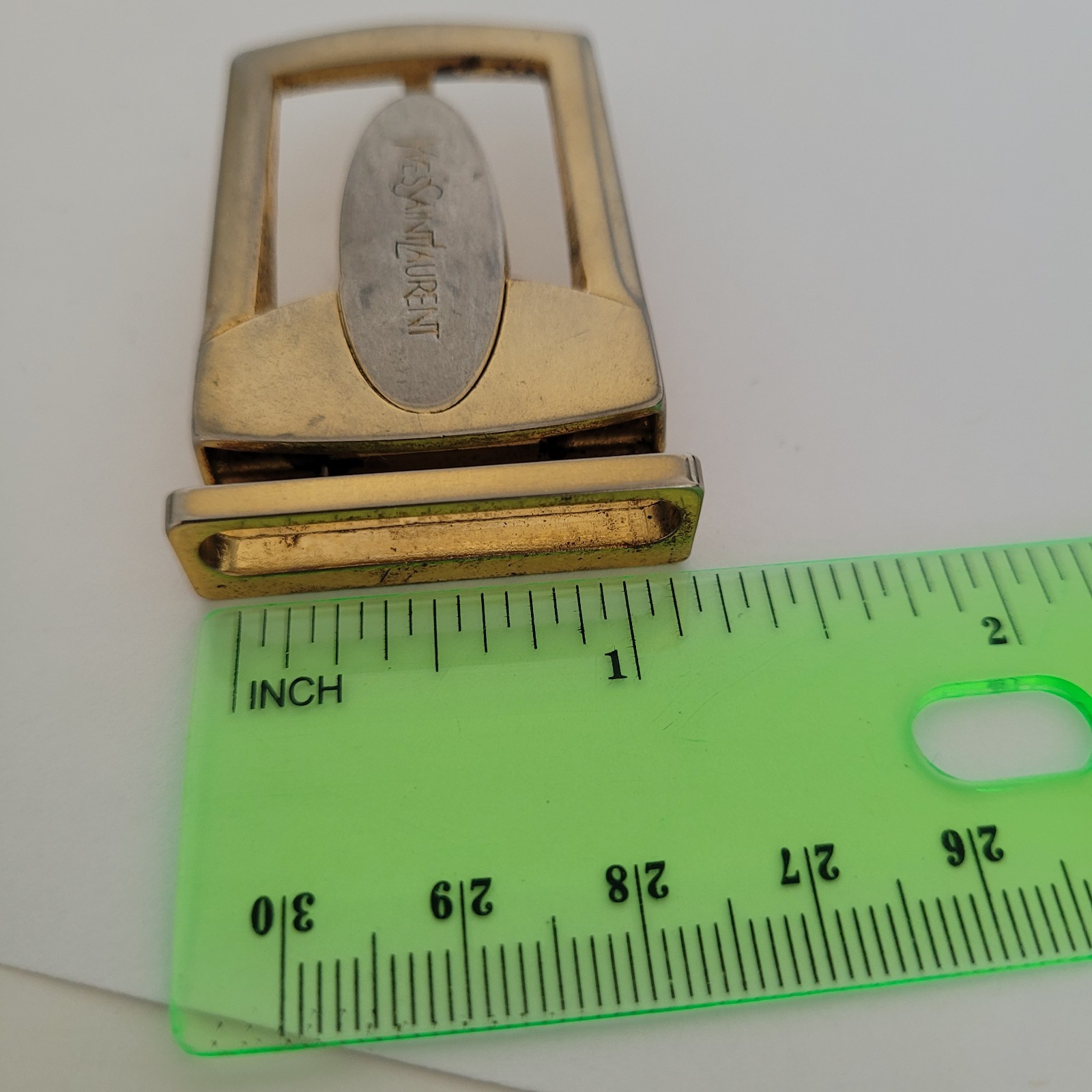 Fibbia per cintura vintage Yves Saint Laurent YSL tono oro argento logo slim