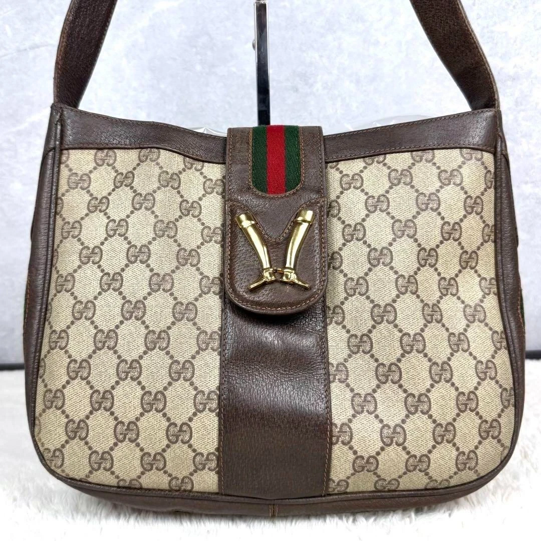 Sac bandoulière vintage Gucci GG Supreme Web Stripe boucle de botte