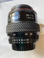 Tokina af 28-70mm f2.8 Nikon , with protective lens.
