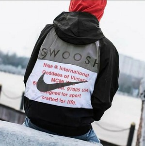 nike swoosh woven hooded jacket