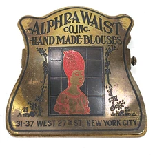 Antique 20s Etched/Enameled Brass Alphra Waist Co NYC Advertising Binder Clip