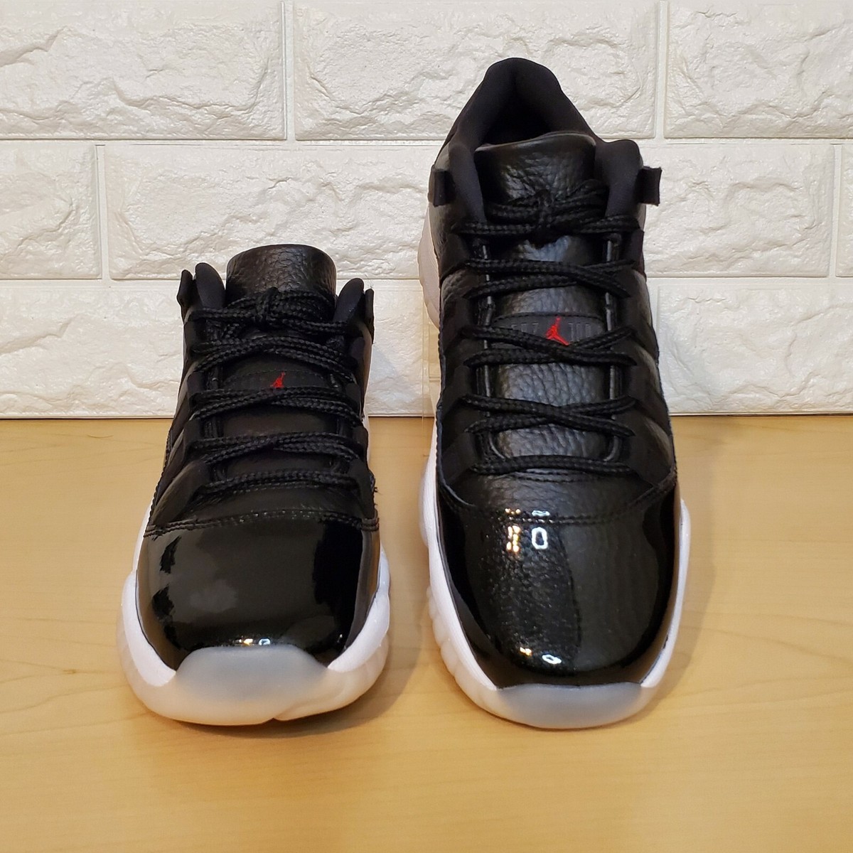 Nike Air Jordan 11 Retro Low 72-10 Black Gym Red White Sail GS 7Y