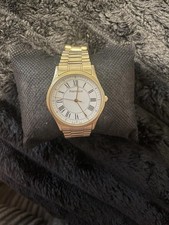 Tiffany & Co Portfolio Swiss Quartz Gold Plated Watch. Roman Dial - Runs Perfect