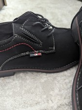 men's black suede derby shoes from the brand Scans, identified by their distinct