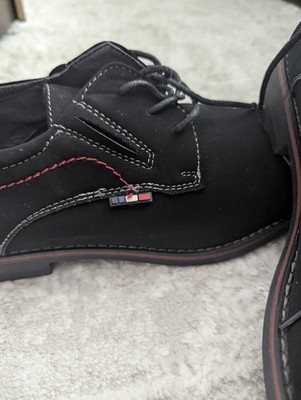 men's black suede derby shoes from the brand Scans, identified by their distinct