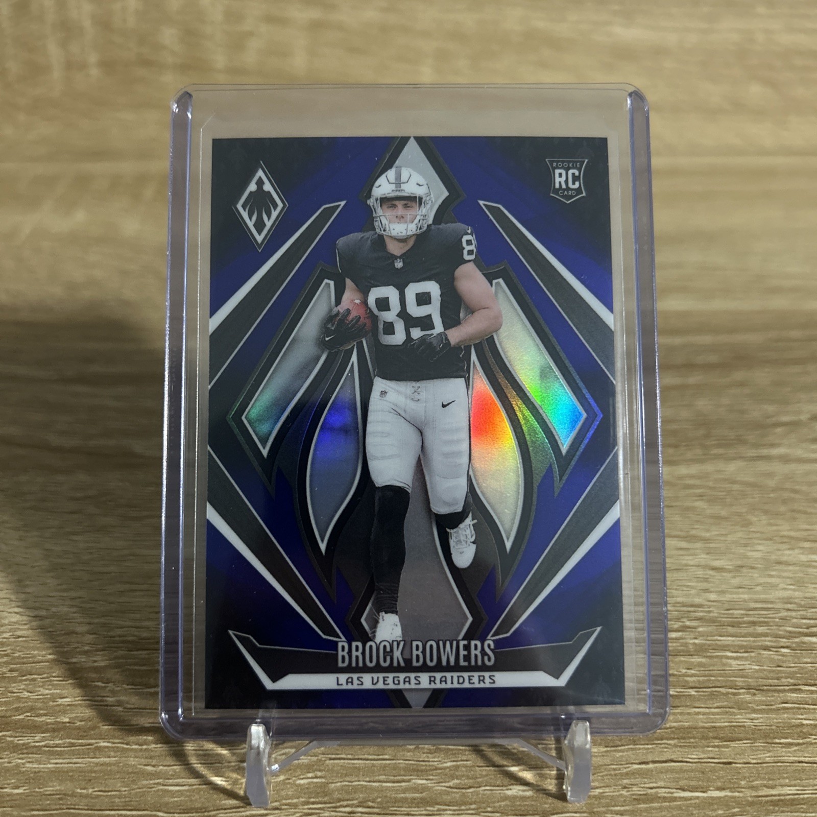 2024 Phoenix - Rookie Brock Bowers #165 Blue Fade /249 Las Vegas Raiders RC