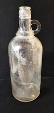 Vintage clear glass jug 1 quart with finger loop handle