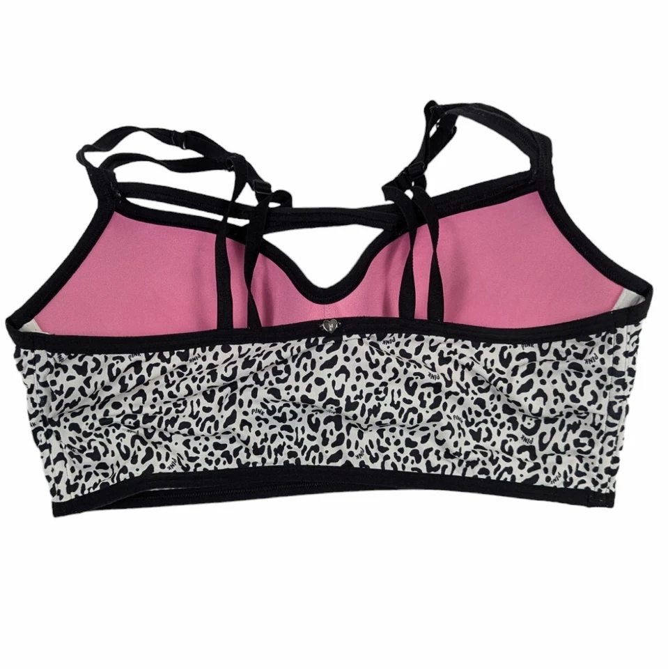 Bralette push up rosa Victoria's Secret para mujer grande negro blanco estampado animal Foto 2 de 4