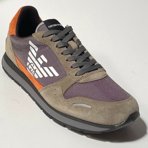 orange and green tennis shoes