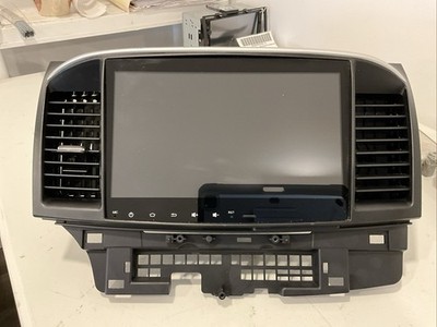 2008-2017 MITSUBISHI LANCER RADIO WITH DASH BEZEL VENTS OEM CHIPPED MISSING CLIP