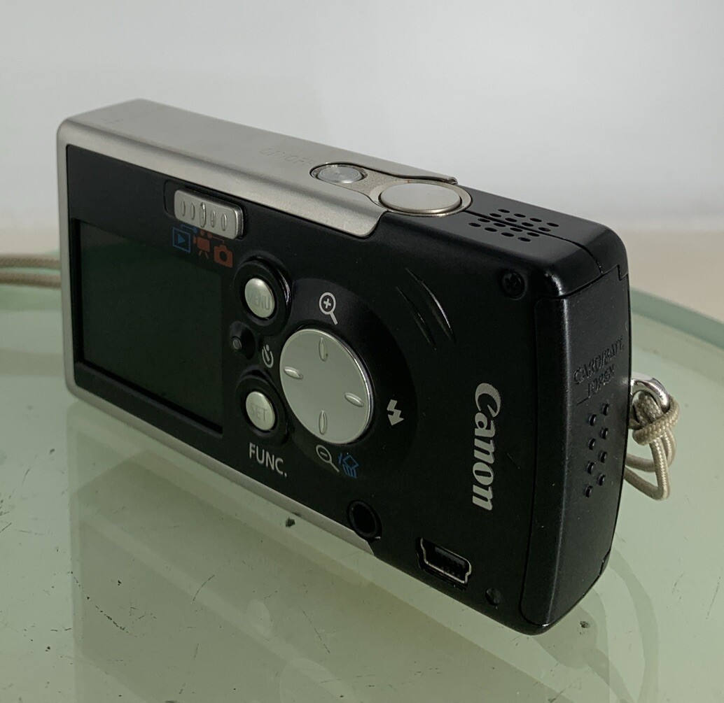 Canon Digital Camera IXUS i PC1060 4.0MP BLACK+CHARGER+COVER