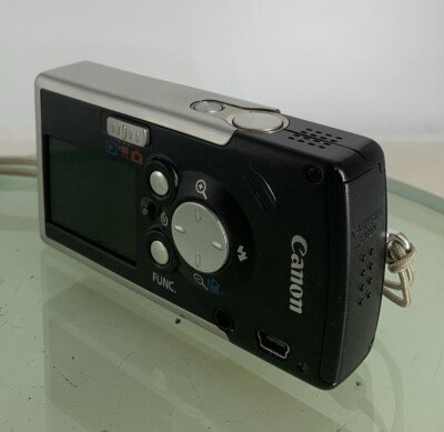 Canon Digital Camera IXUS i PC1060 4.0MP BLACK+CHARGER+COVER