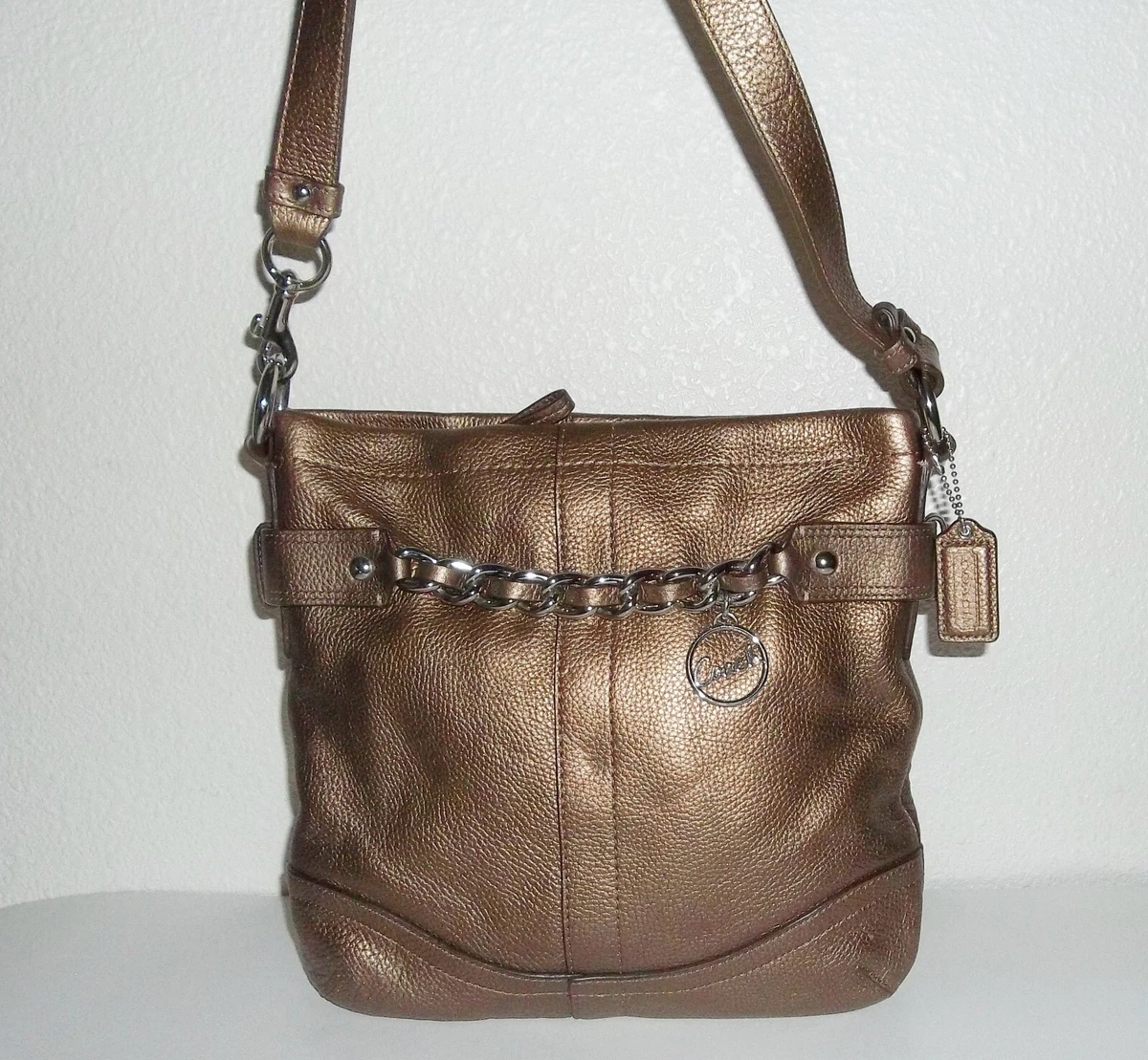 Bronze coach purse hotsell
