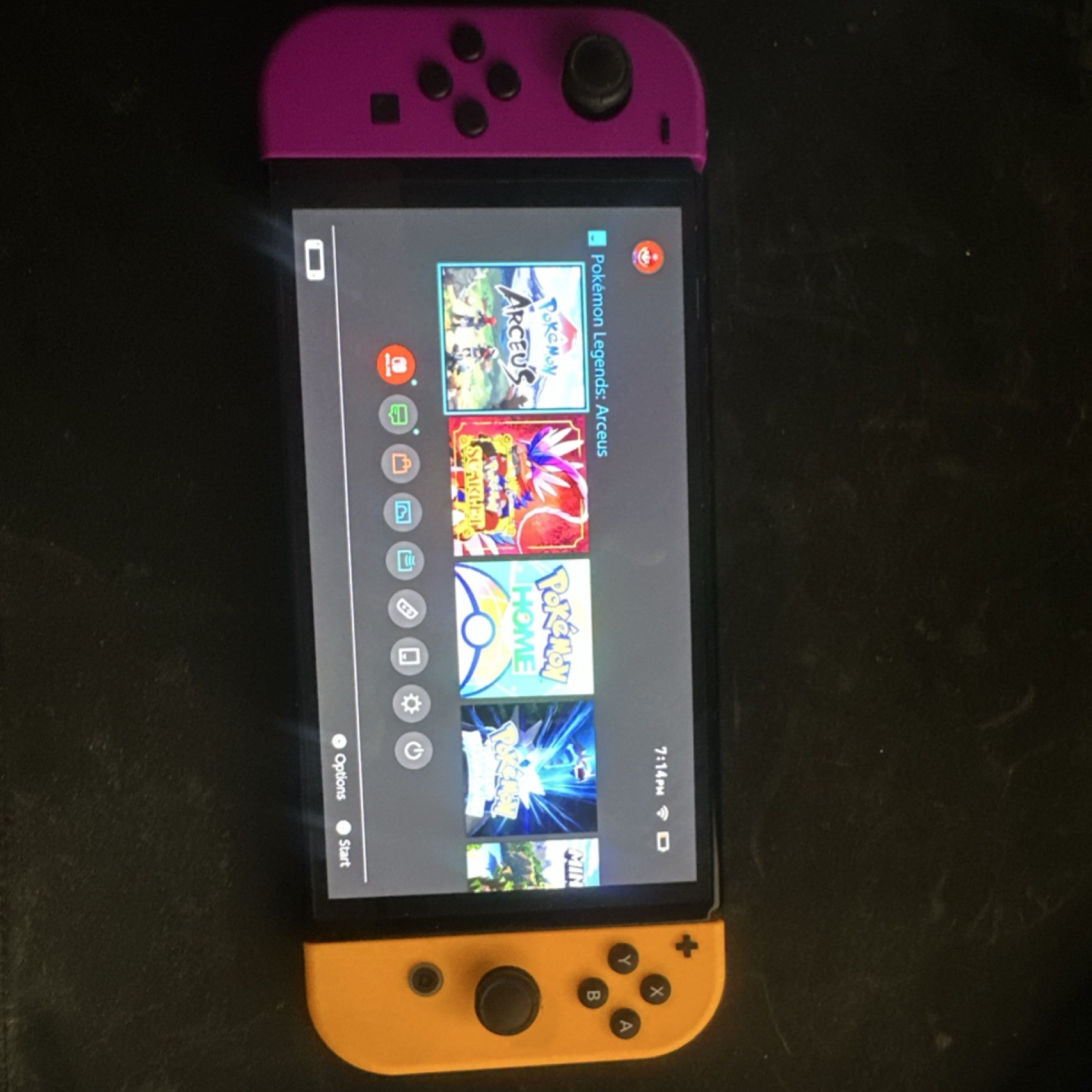 Nintendo Switch (OLED) Console with Purple & Yellow Joy-Con Controllers and Dock