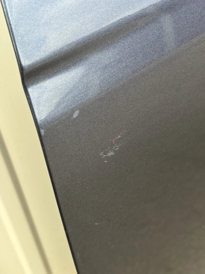 Carcasa de puerta lateral del conductor Tesla Model Y 2020-2024 gris izquierda OEM Foto 2 de 4