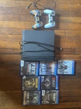 Sony PlayStation 4 Slim 1TB Console - Jet Black