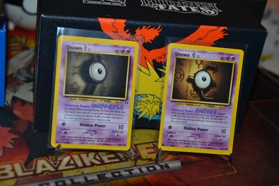 MPokemon TCG 2X Unown I 68/75 + Unown E 67/75 Unlimited Neo Discovery NM