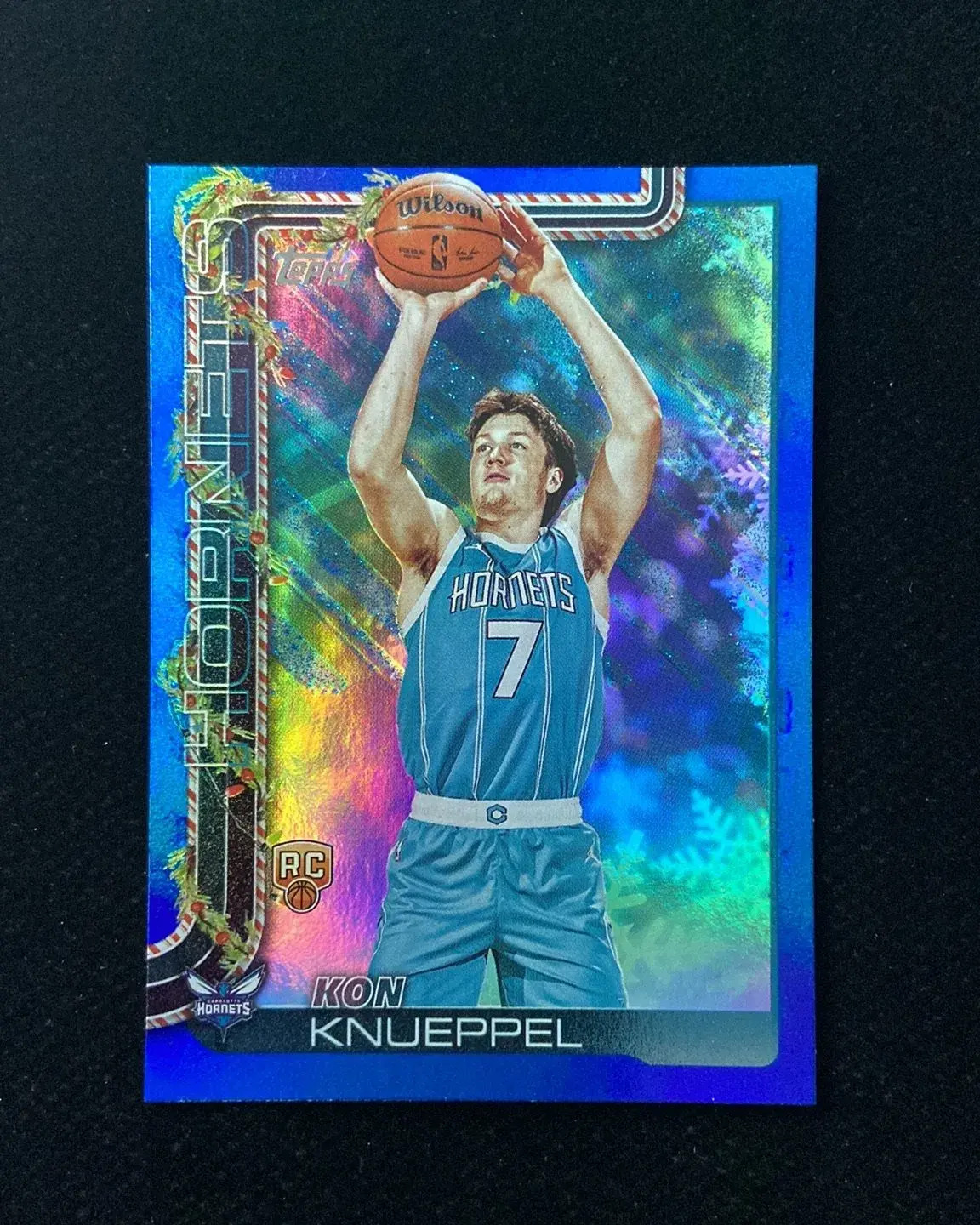 2025-26 Topps Holiday Blue Glitter #H164 Kon Knueppel RC Rookie Hornets HD