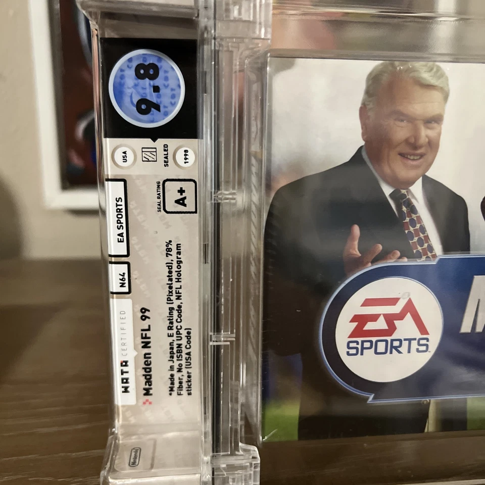 9.8 A+ SELLADO Madden NFL 99 Fútbol WATA NUEVO V-Seam Nintendo 64, 1998 Foto 2 de 4