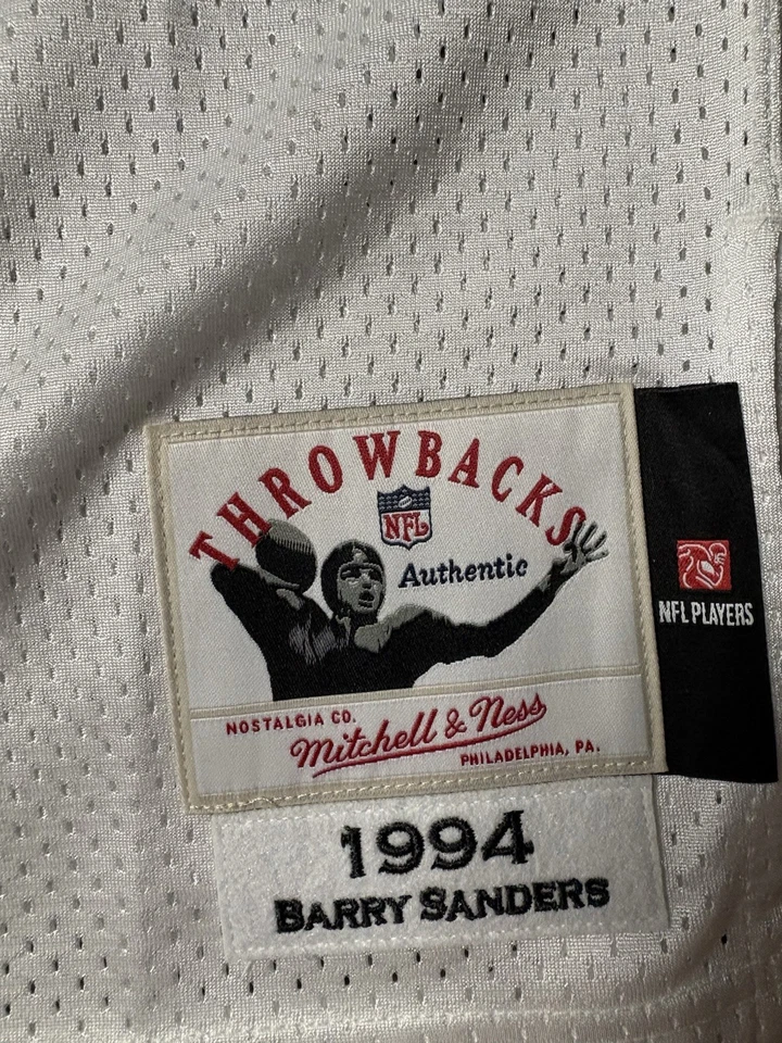 CAMISETA MITCHELL & NESS AUTÉNTICA BARRY SANDERS L DETROIT LIONS $300 VENTA AL POR MENOR BLANCA Foto 4 de 4