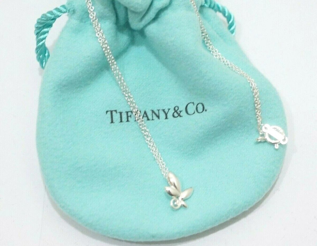 Tiffany & Co. - Paloma Picasso® Olive Leaf pendants in sterling silver and  18k gold. Explore the collection: http://bit.ly/14urUnw | Facebook