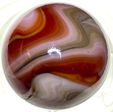 DAS/JABO BEAUTIFUL OXBLOOD WAVY SWIRLED SHOOTER SIZE .74" BOX03/220