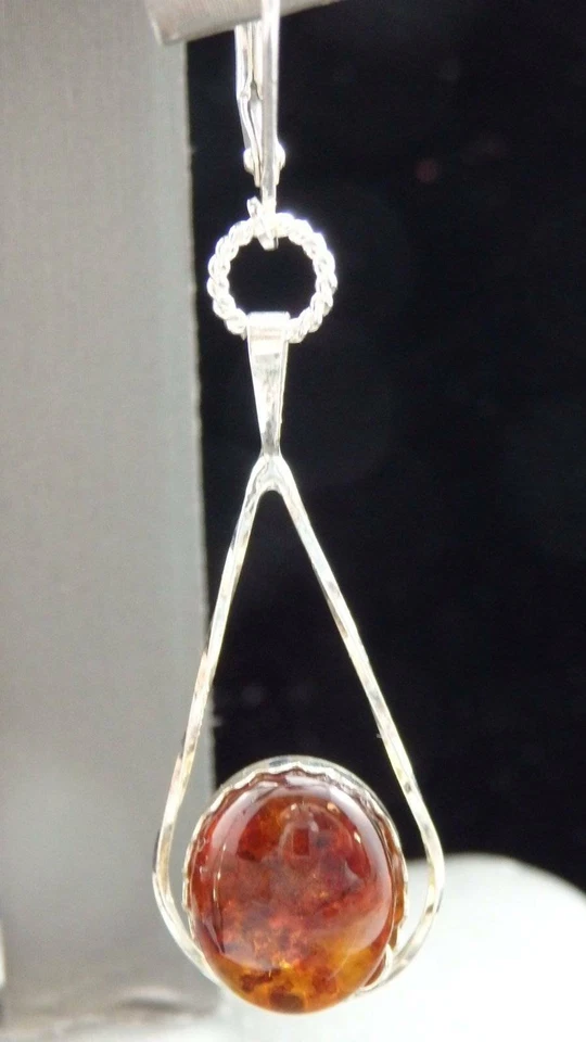Pendientes colgantes de miel ámbar báltico torcidos de ley Foto 4 de 4