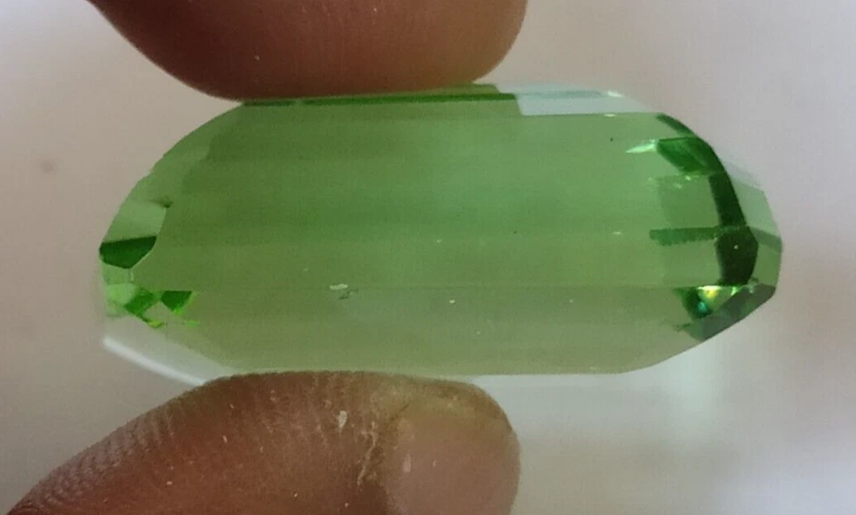 AAA+ 55.50 Ct. Green Peridot Translucent Faceted Emerald Cut Loose Gemstone Ring - Image 3 of 4