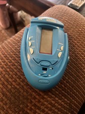 Radica Games 2003 Tetris blu illuminato manuale a batteria gioco testato