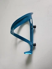 Supacaz Fly Cyxling Water Bottle Cage Anodized Blue