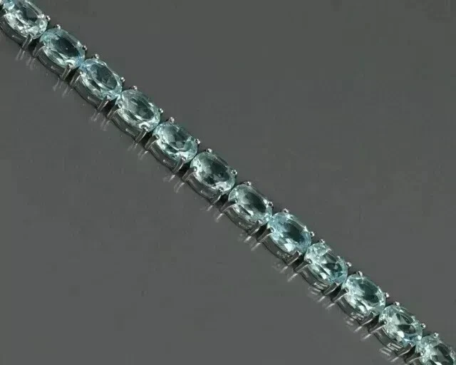 Brazalete Tenis Aguamarina Creado en Laboratorio Corte Ovalado 9Ct Chapado en Oro Blanco 14K Foto 2 de 3